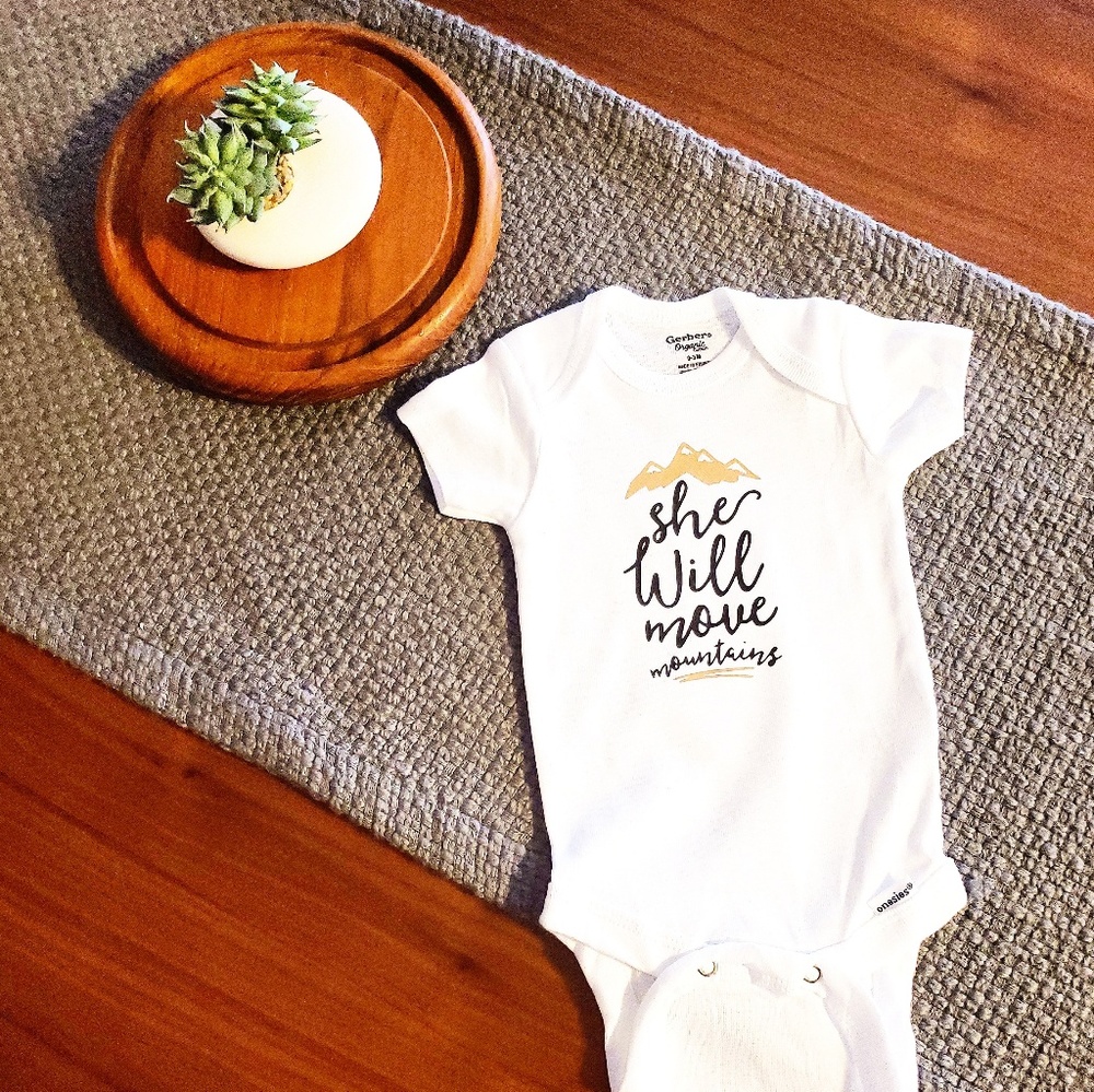 She Will Move Mountains Onesies